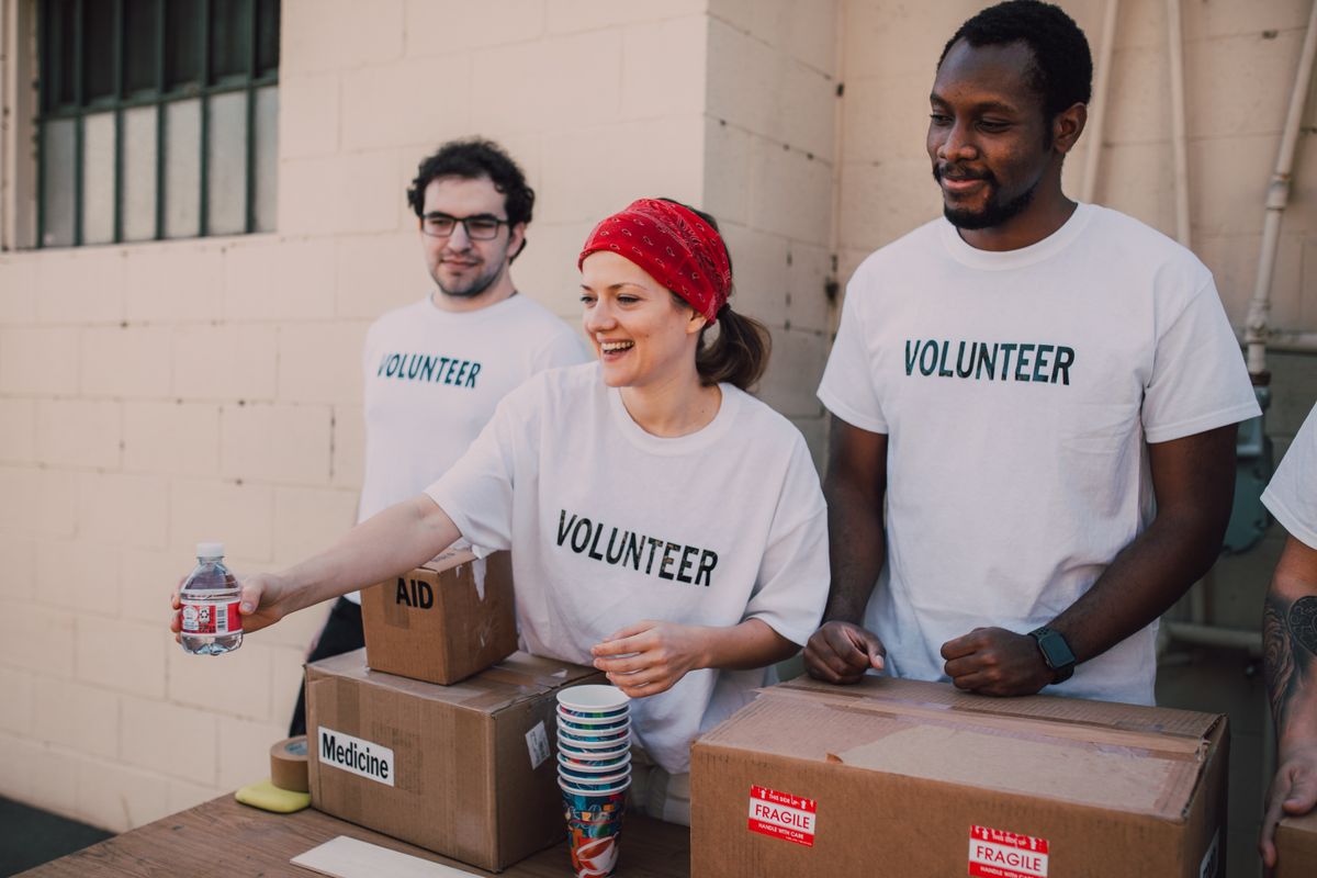 Community volunteers distributing health resources